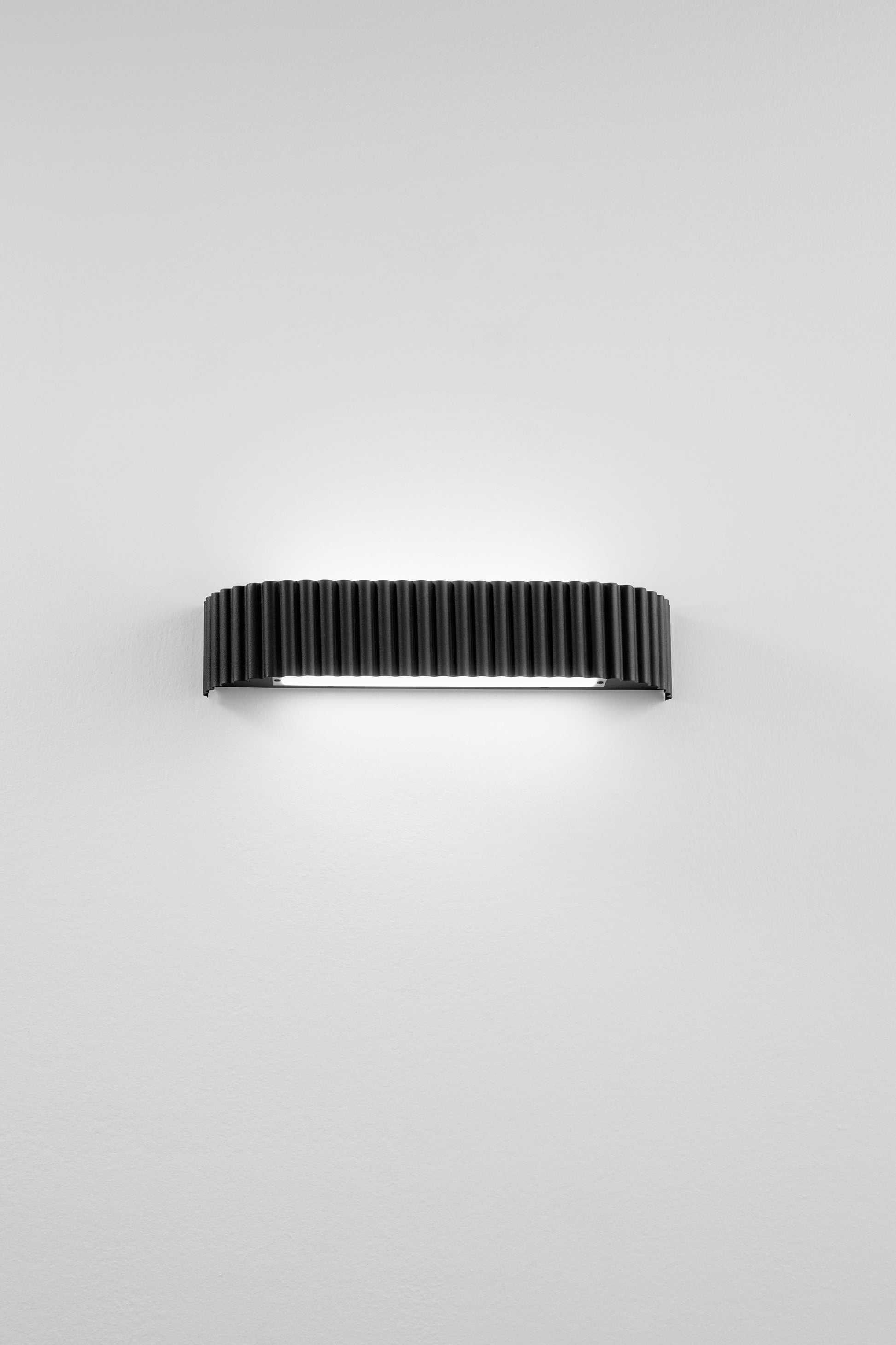 Applique NIKE in metallo nero | FT Feel The